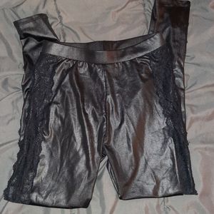 Black leggings with lace on sides.
